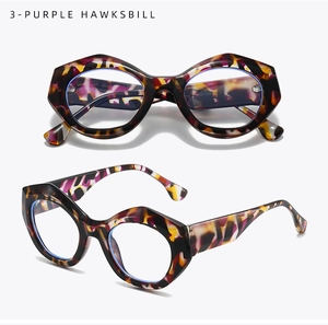 Detailed view of Purple Hawksbill geometric eyeglasses frame with thick acetate texture