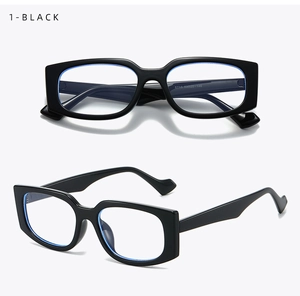 Detail view of black rectangular glasses frame with blue light blocking lens and size specs