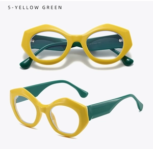 Detail view of yellow and green oval eyeglass frame showing model numbers on temple