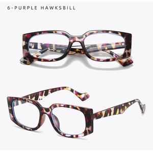Detail view of purple hawksbill rectangle frames with blue light blocking lenses