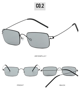 Detail view of lightweight black metal frame sunglasses with screwless hinge design