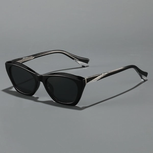 Modern black cat-eye sunglasses with textured silver metal temples and dark lenses