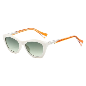 White cat-eye sunglasses with green gradient lenses and orange contrast temples