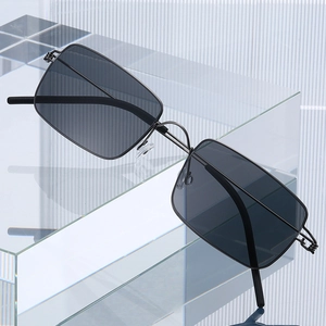 Minimalist square metal frame sunglasses with lightweight screwless design and dark grey lenses