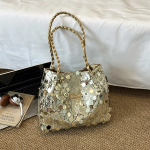 Fashionable sequin tote bag in champagne gold with metallic handles for women