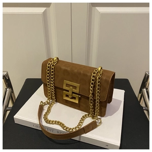 Close-up of leopard print shoulder bag with gold hollow square lock and chain