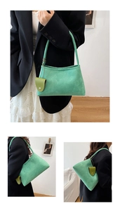 Détail du sac cabas en daim vert menthe montrant sa texture et sa bandoulière nouée