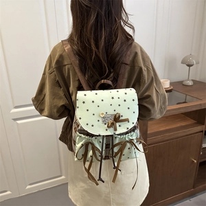 Mint green bow backpack with star pattern and brown ribbons for student daily wear