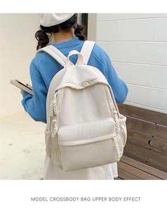 Damen Cord Rucksack in Cremeweiß mit strukturierter Oberfläche und Fronttasche