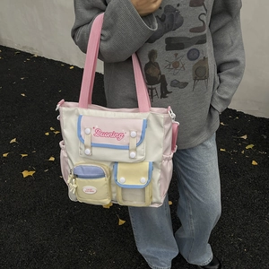 Multi-pocket functional canvas tote bag in pastel colors for school and casual use