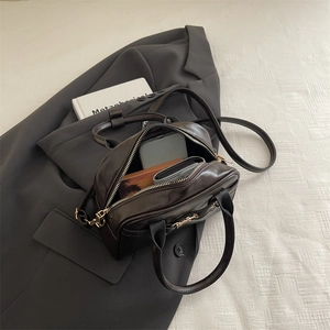 Retro coffee brown PU leather Boston bag with dual handles and crossbody strap