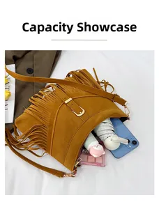 Practical capacity view of brown suede fringe crossbody bag with daily essentials