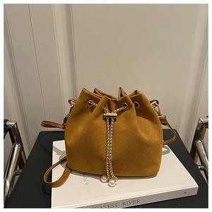 Brown frosted bucket bag with gold chain drawstring and elegant pearl accents