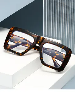 Macro shot of tortoiseshell square glasses frame with detailed temple specifications