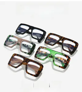 Collection of oversized square blue light glasses in various colors with thick frames