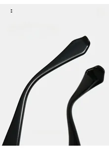 Macro detail of ergonomic curved black mirror legs on stylish thick square glasses frame