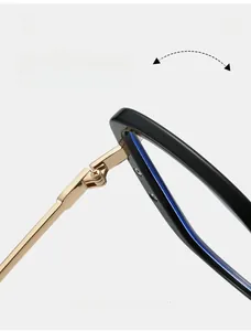 Detail of durable gold metal hinge on black square glasses frame for women