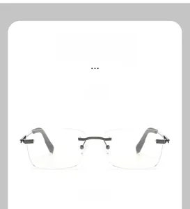 Front view of rimless gunmetal frame eyeglasses with anti-blue light clear lenses