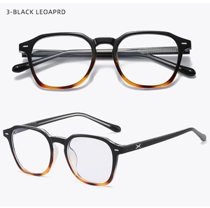 Close-up of retro black and leopard gradient optical frames with silver metal accents