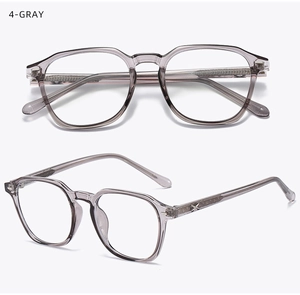 Detail of transparent gray polygon glasses frame with metal star logo on temple