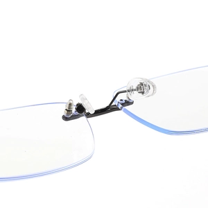 Frameless blue light blocking glasses with black metal bridge and soft silicone nose pads