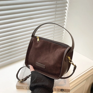 Brown frosted suede tote bag with top handle and adjustable shoulder strap for women