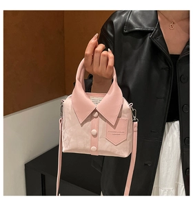 Close-up of pink bucket bag featuring a creative shirt design with collar and buttons