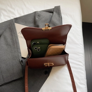 Chic burgundy leather square handbag with golden CD metal buckle and spacious interior