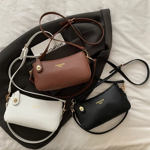 Three elegant vintage-style large capacity shoulder bags in white, brown, and black colors