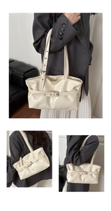 Detailed views of a cream patent leather shoulder bag with adjustable silver buckle straps