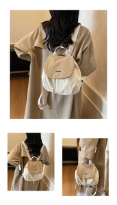 Detail of color-block nylon backpack featuring drawstring closure and top handle strap