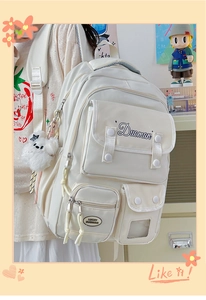 Side view of cream campus backpack with large capacity and cute plush pendant