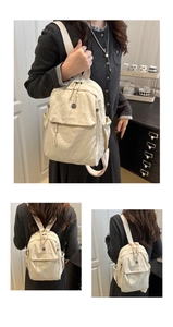 Detail of beige nylon hiking backpack with textured fabric and wide shoulder straps