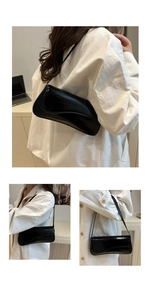 Detail view of black patent leather flap bag with wavy edge and glossy finish