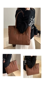 Detailed view of large brown quilted tote bag with faux leather straps and lattice texture