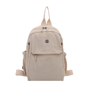 Minimalist beige nylon backpack for women with front zipper pocket and metal logo