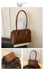 Detail of coffee brown tote bag showing smooth matte texture and curved opening design