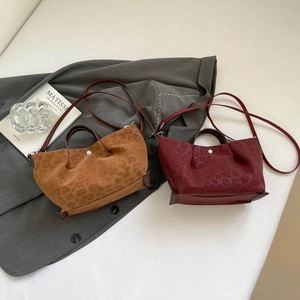 Stylish leopard print tote bags in brown and dark red colors with a premium suede texture