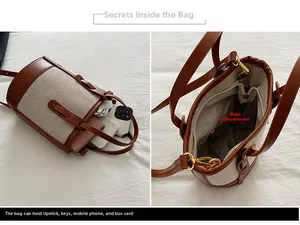 Detail view of contrast bucket bag interior showing capacity for phone and wallet