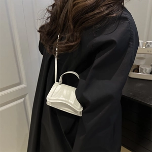 Fashion white mini crossbody handbag with top handle and sleek flap closure for women