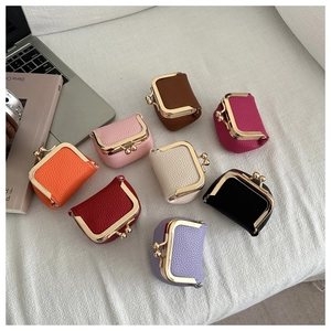 Mini PU leather jewelry pouches with vintage metal clasps in eight assorted colors