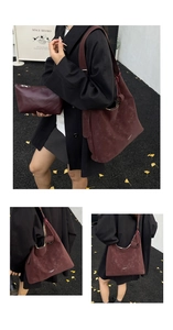 Detail of burgundy frosted tote bag and matching pouch for autumn winter commute