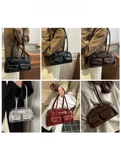 Chic glossy underarm pillow bag shown in various colors on a stylish model