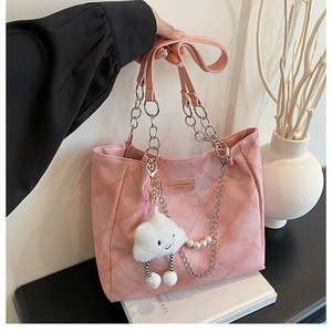 Pink quilted tote bag with silver chain strap and cute cloud plush charm detail