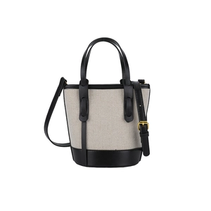 Modern color-block bucket bag in beige woven canvas and black leather with shoulder strap