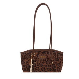 Classic leopard print suede tote bag with leather straps and fashion label detailing