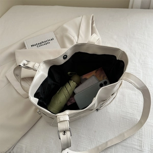 Minimalist beige PU leather tote bag with large capacity for daily commuting