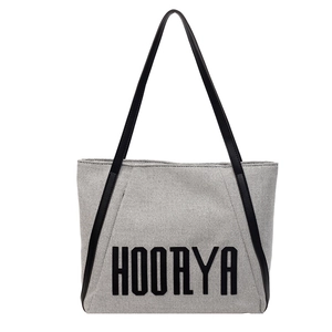 Large capacity canvas tote bag with HOORYA lettering and black contrast straps