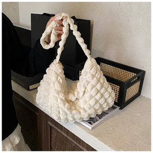 Detail of the white popcorn texture fabric on this stylish large shoulder tote bag