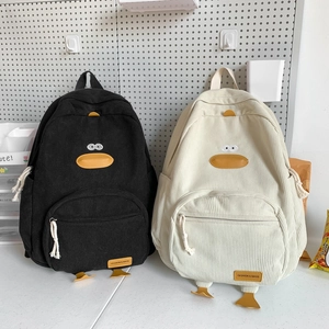 Cute corduroy duck backpack in black and beige with 3D cartoon features and large capacity